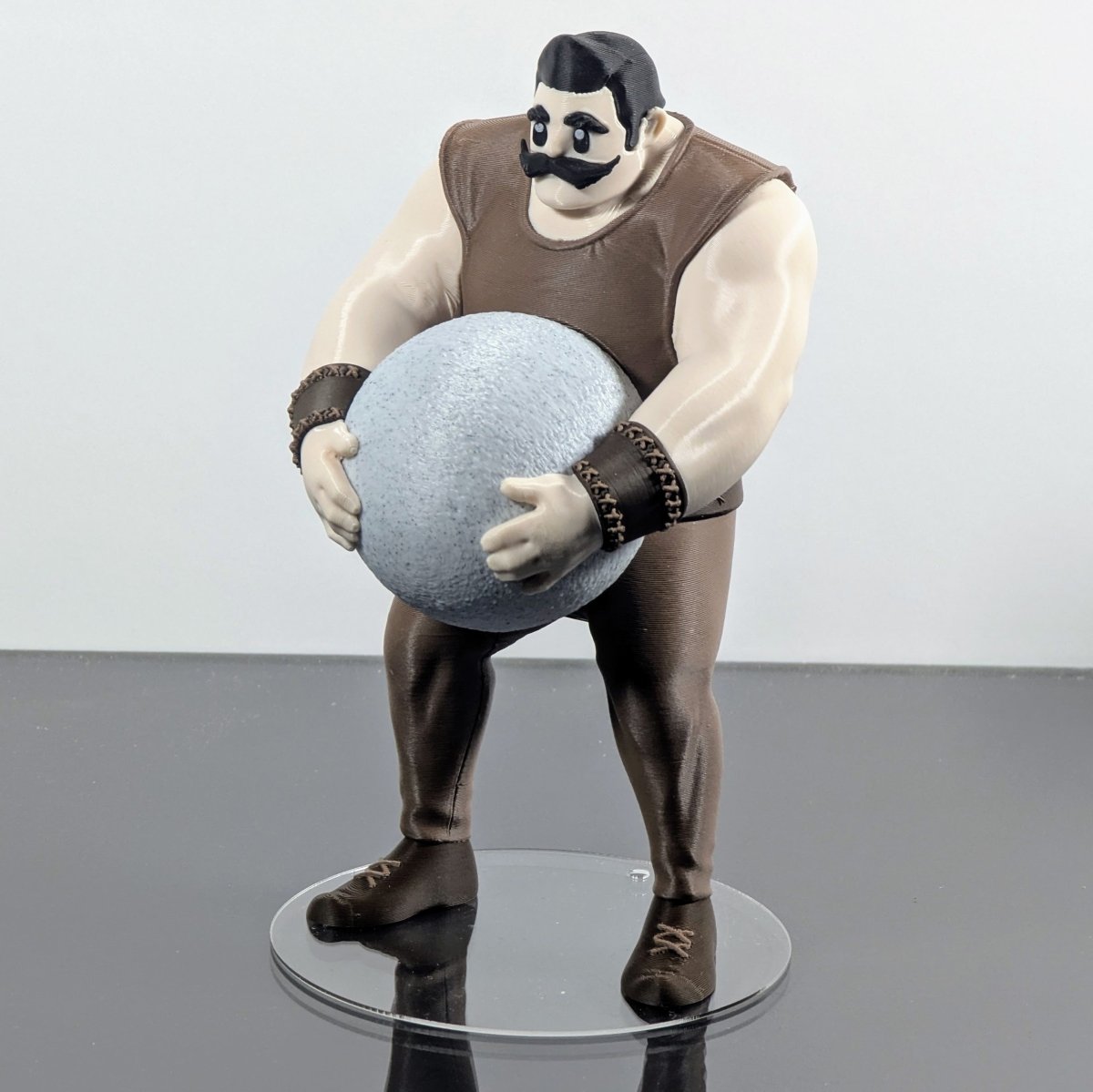Vintage Strongman Lifting an Atlas Stone - Figures of strength
