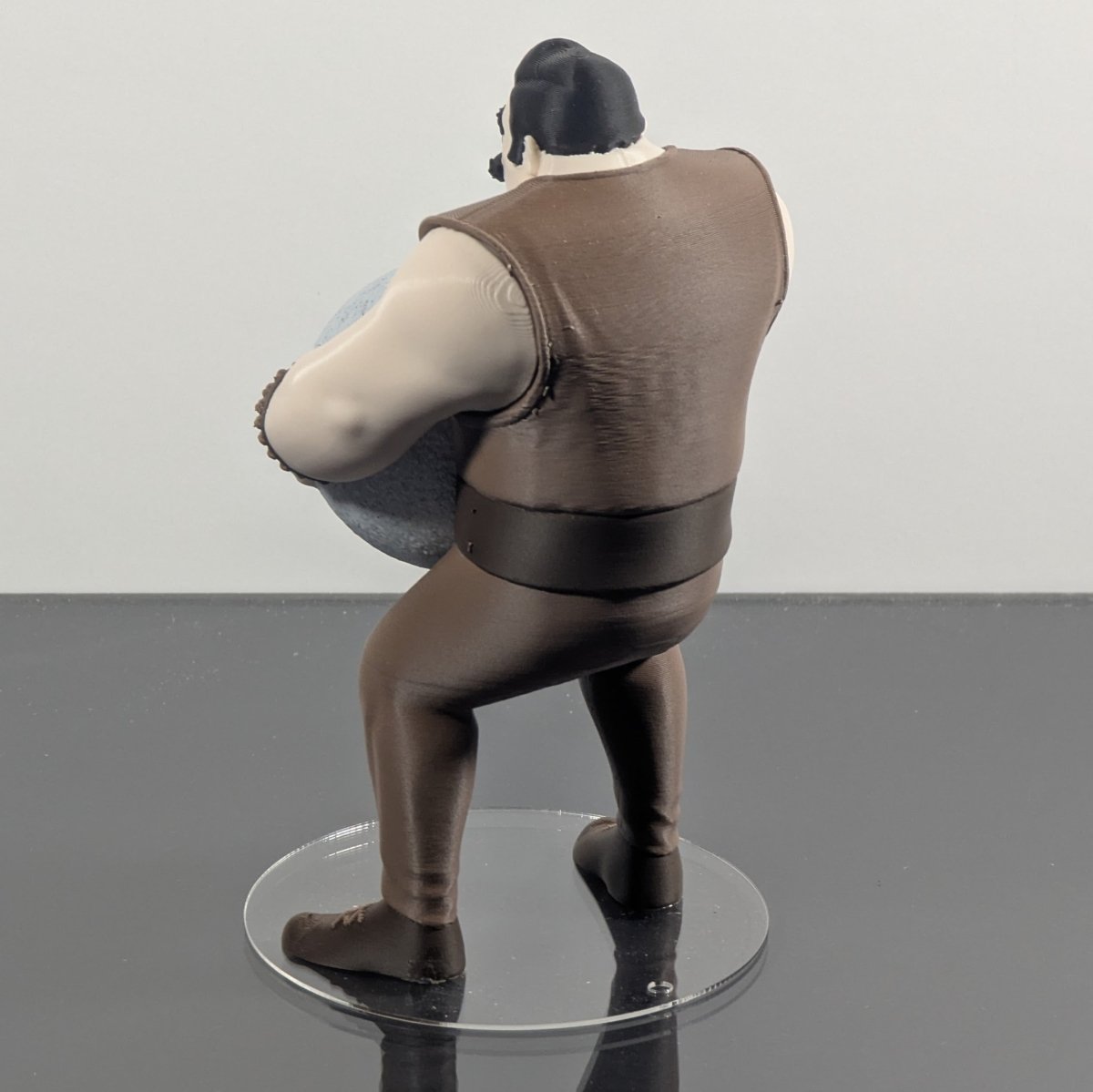 Vintage Strongman Lifting an Atlas Stone - Figures of strength