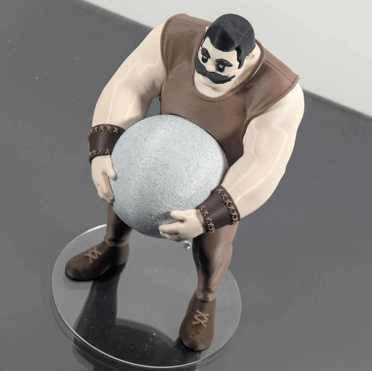 Vintage Strongman Lifting an Atlas Stone - Figures of strength
